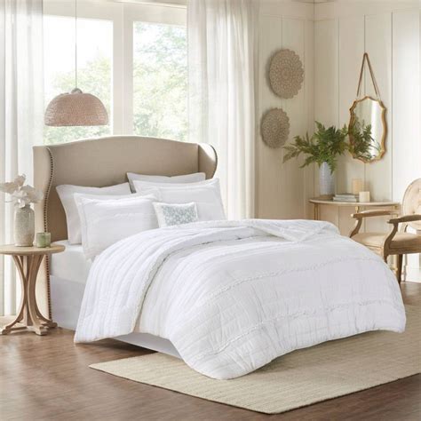 A typical bedding set usually includes a duvet cover or comforter, pillow shams or pillowcases, and a fitted sheet or bed skirt. . Target bedding sets